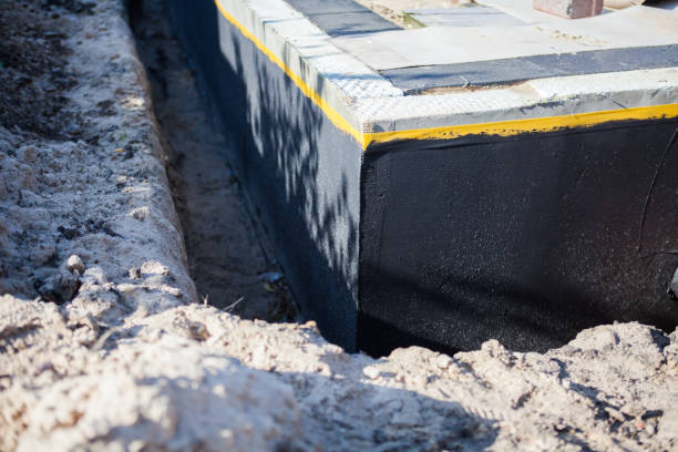 Professional Waterproofing technician working in Algoma, WI
